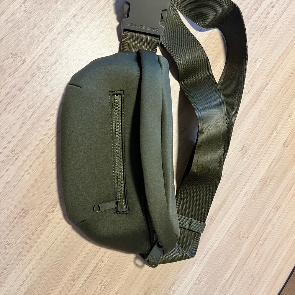 Brand new, olive green Dagne Dover Ace fanny pack with dust bag